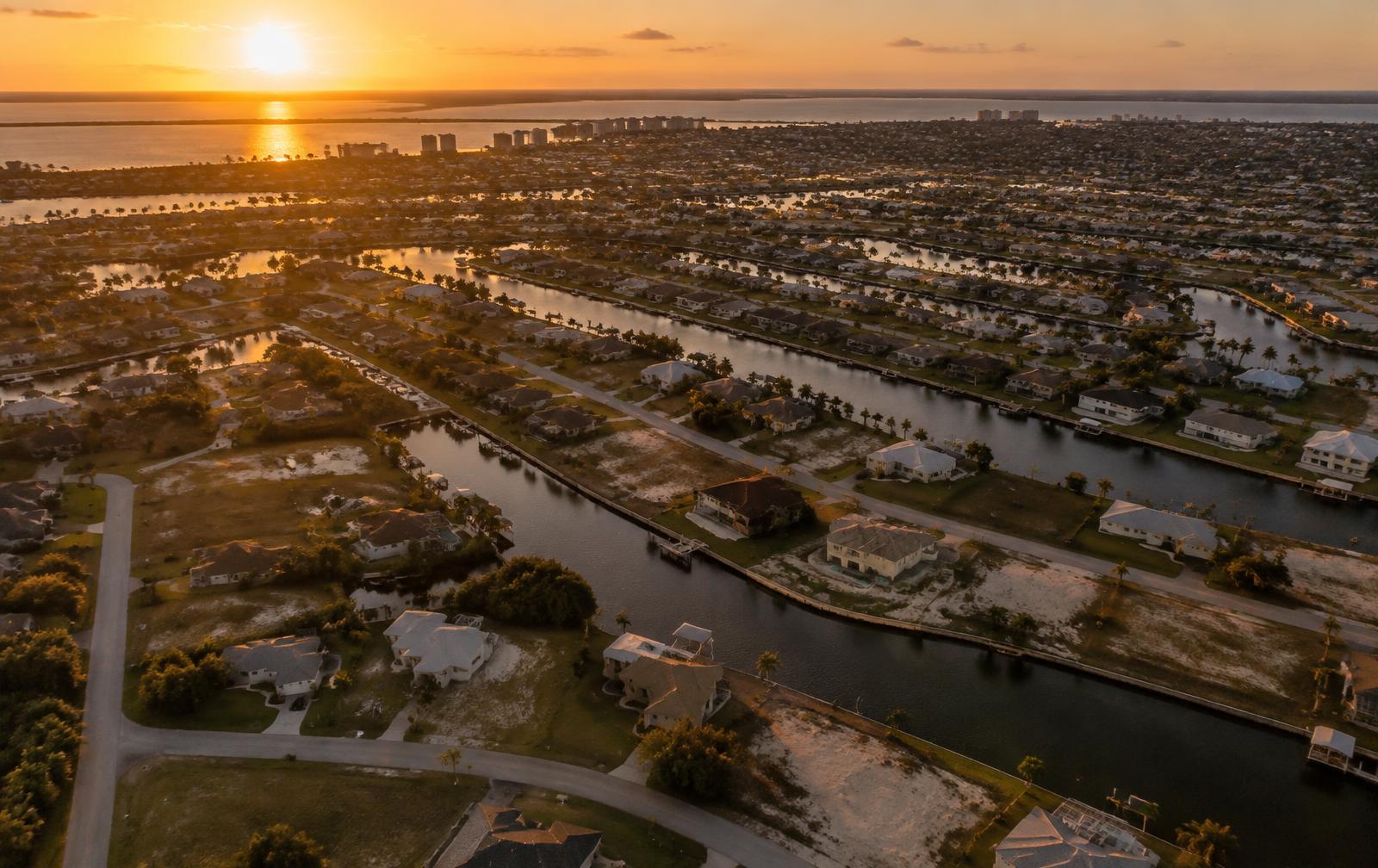 Aerial golden-hour view of Southwest Florida residential parcels